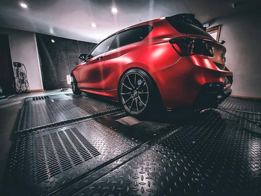 Red BMW 1 Series on the rolling road