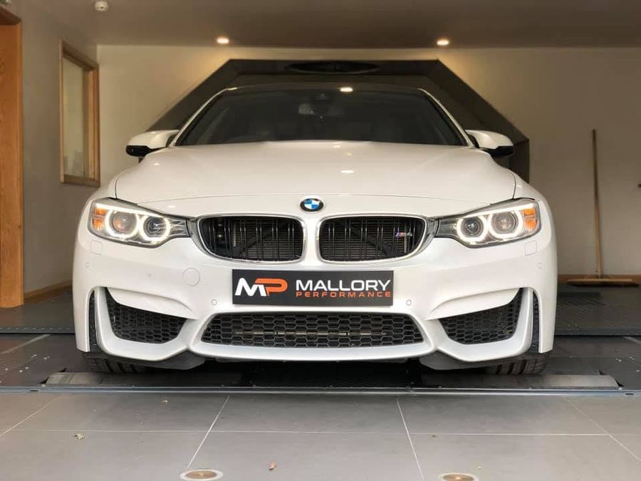 White BMW M4 on the rolling road
